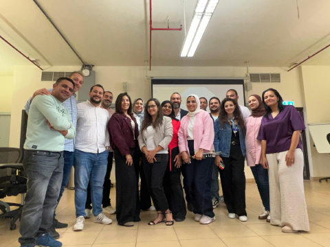 Dr. Moustafa Awad with participants from a Banque Misr AI in Banking cohort.
