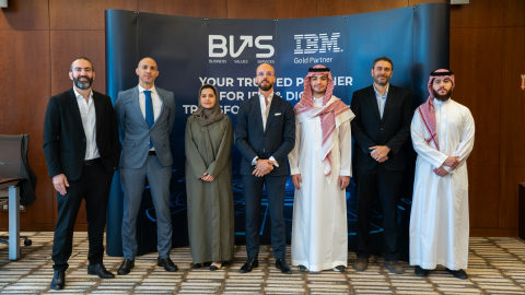 Dr. Moustafa Awad pictured with the IBM team at a banking industry event in Saudi Arabia.