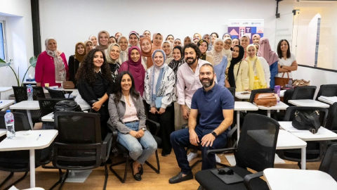 Dr. Moustafa Awad with participants at the TechHerUp workshop for women in technology.